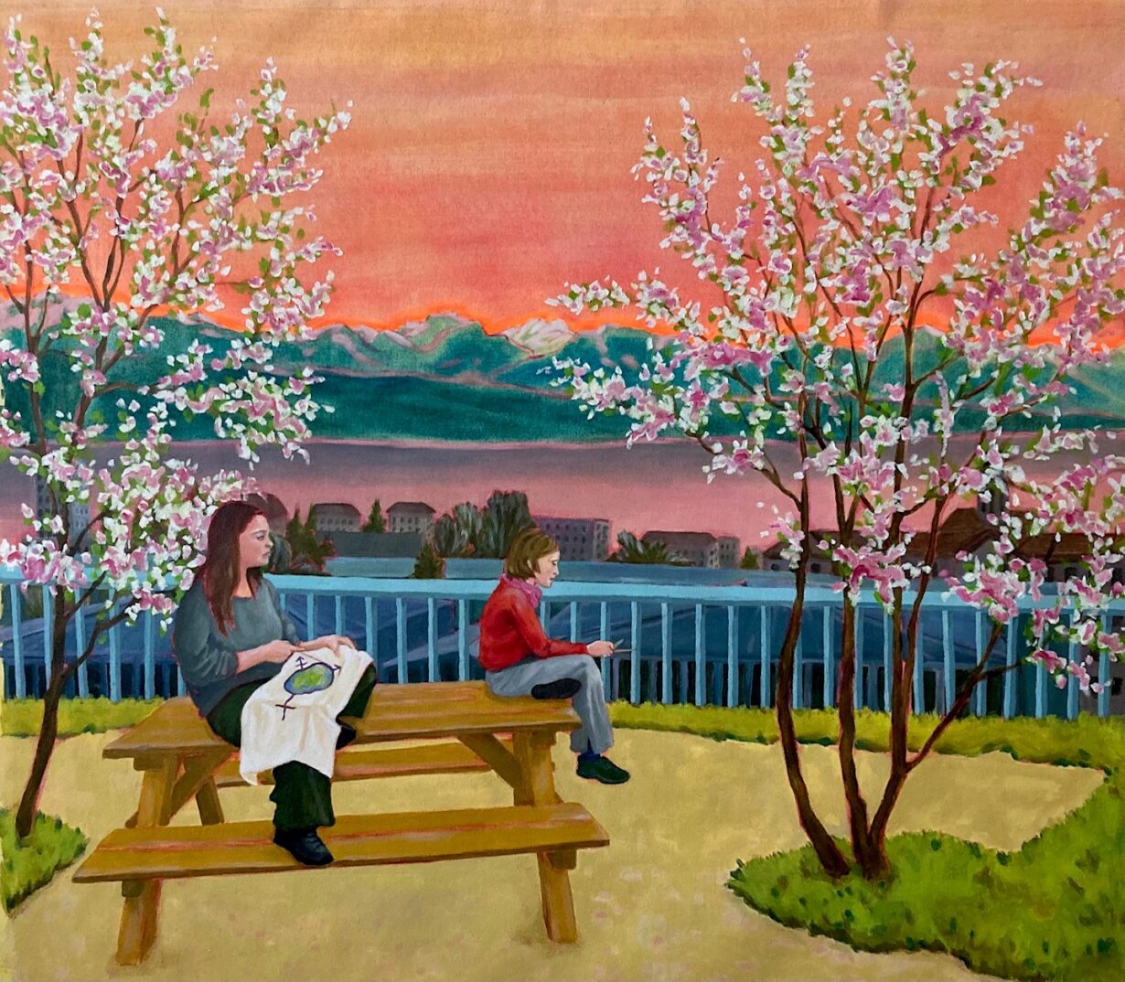 The painting shows a young woman and child seated on a picnic table. To the left and right are blossoming cherry trees. Behind them, below, we see buildings, then the lake, pink, and finally the turquoise mountains. The sky is orange.